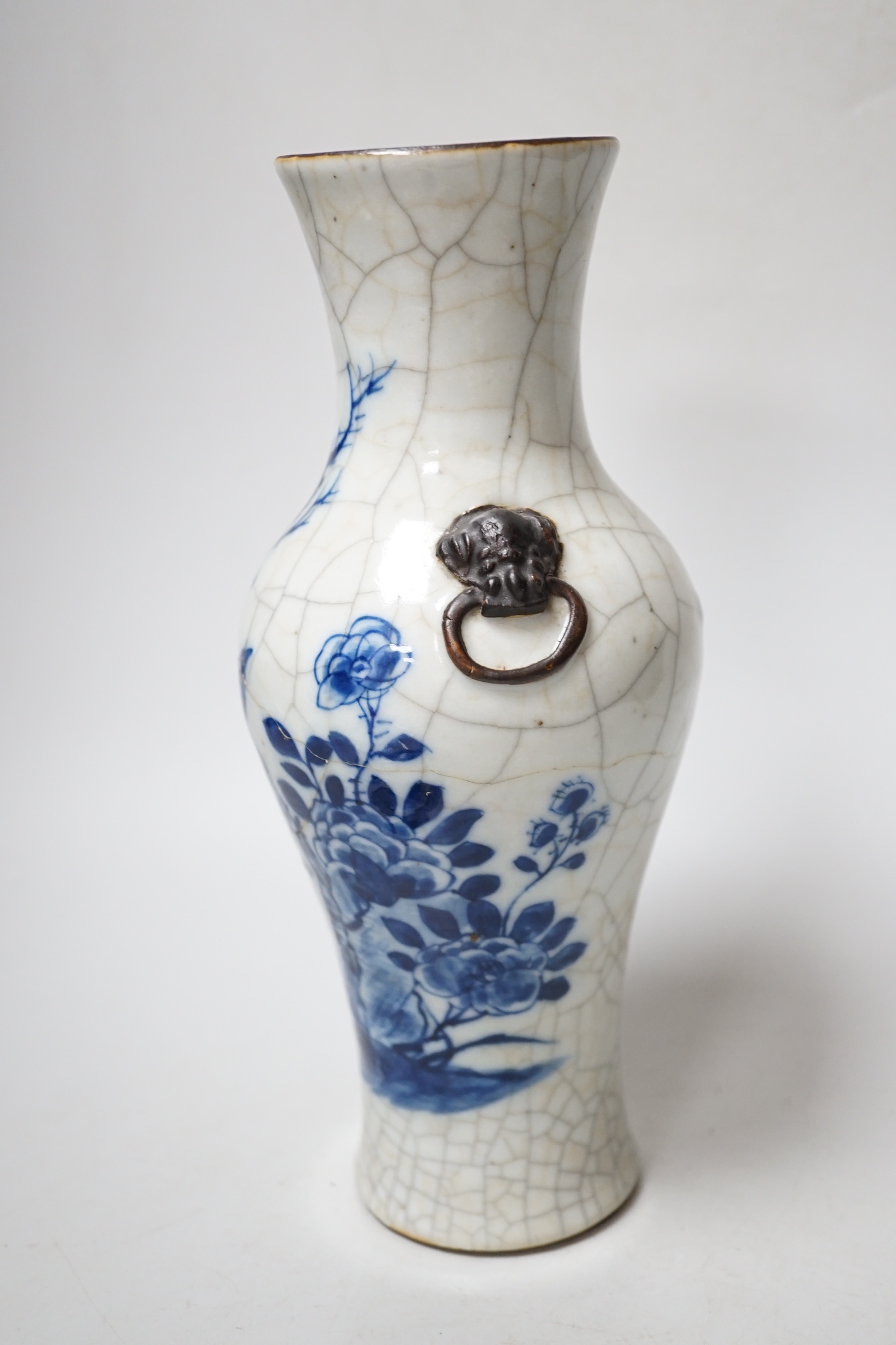 A Chinese blue and white bottle vase with figural decoration and two similar bowls, vase 17cm tall